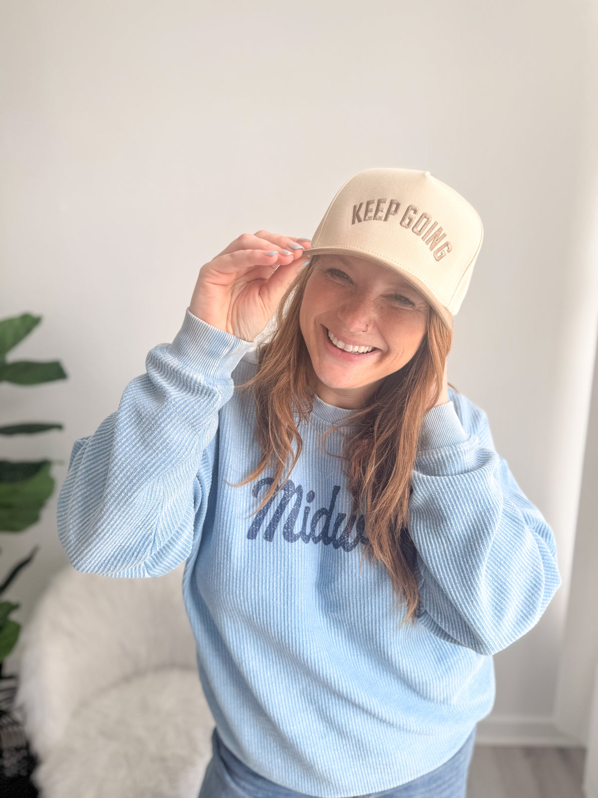 Keep Going Trucker Hat