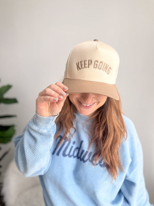 Keep Going Trucker Hat